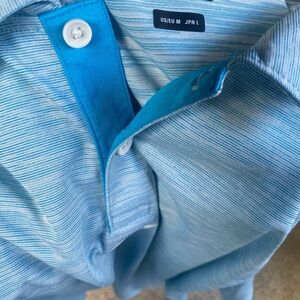 Oakley polo shirt size medium NWT light blue